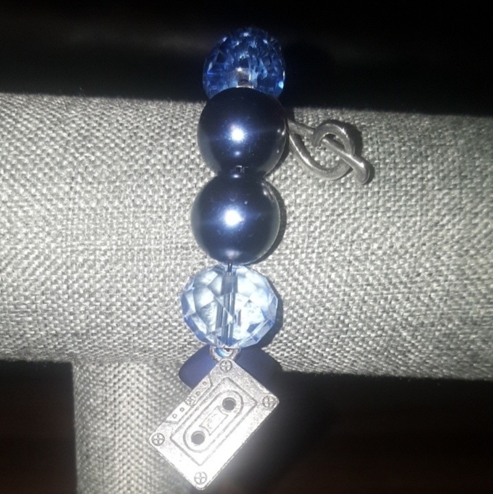 Handmade beaded bracelet with music charms